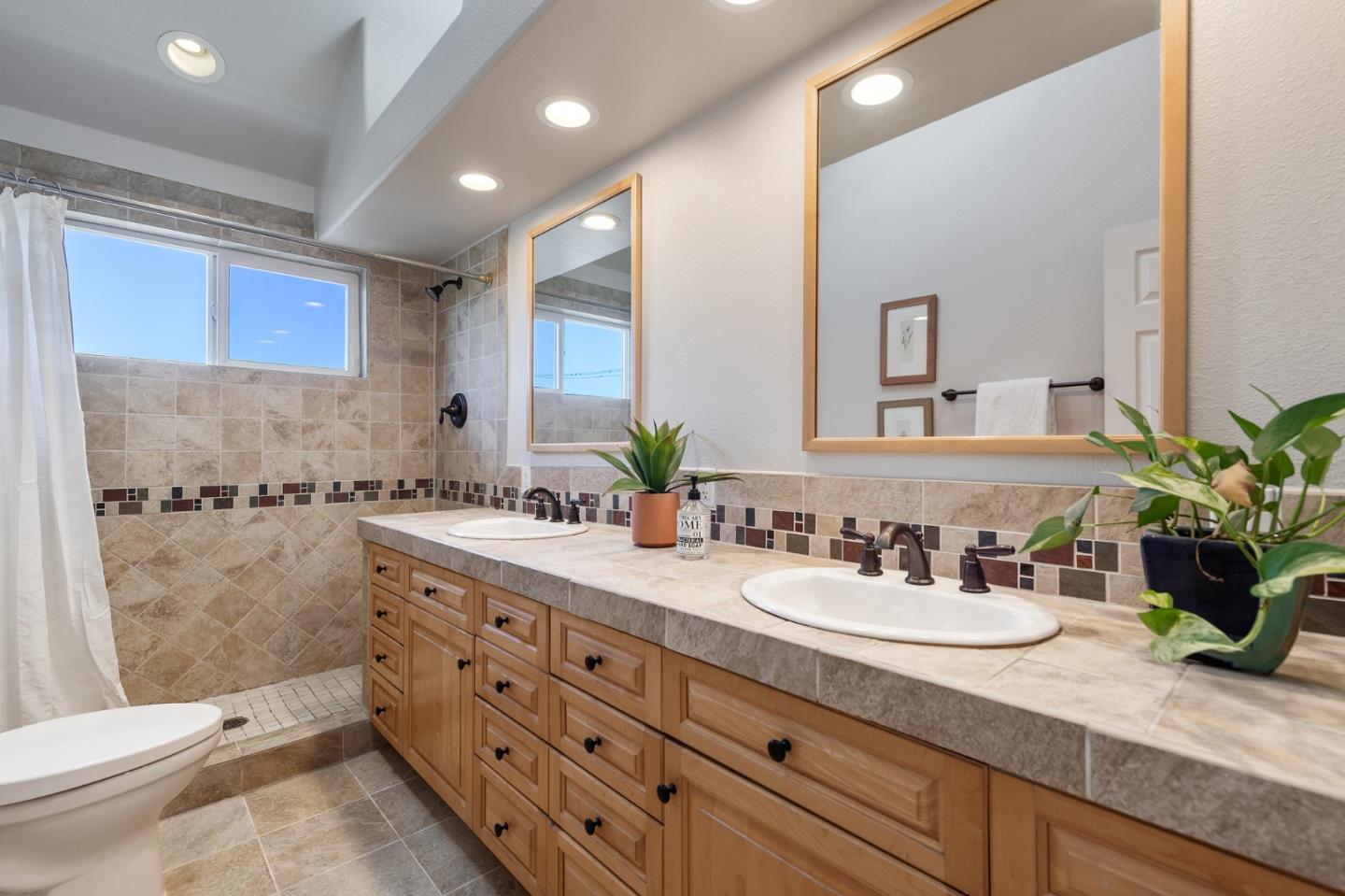 851 Almarida Drive Campbell, CA 95008 - Photo 49 of 63 a bathroom with a granite countertop sink mirror and toilet