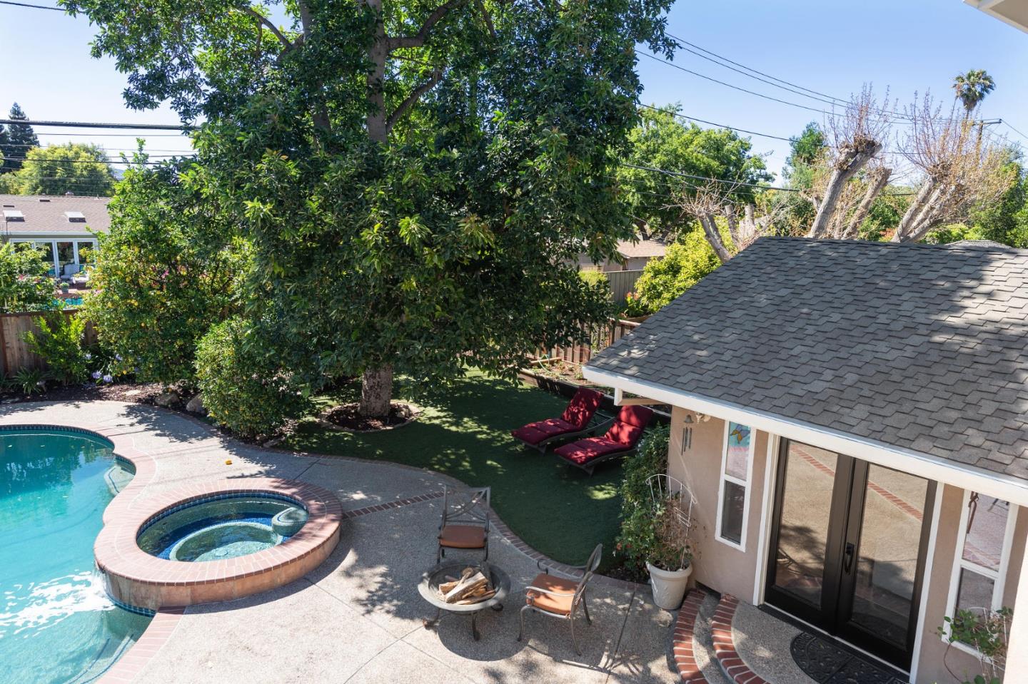 851 Almarida Drive Campbell, CA 95008 - Photo 51 of 63 a backyard of a house with lots of green space and fountain
