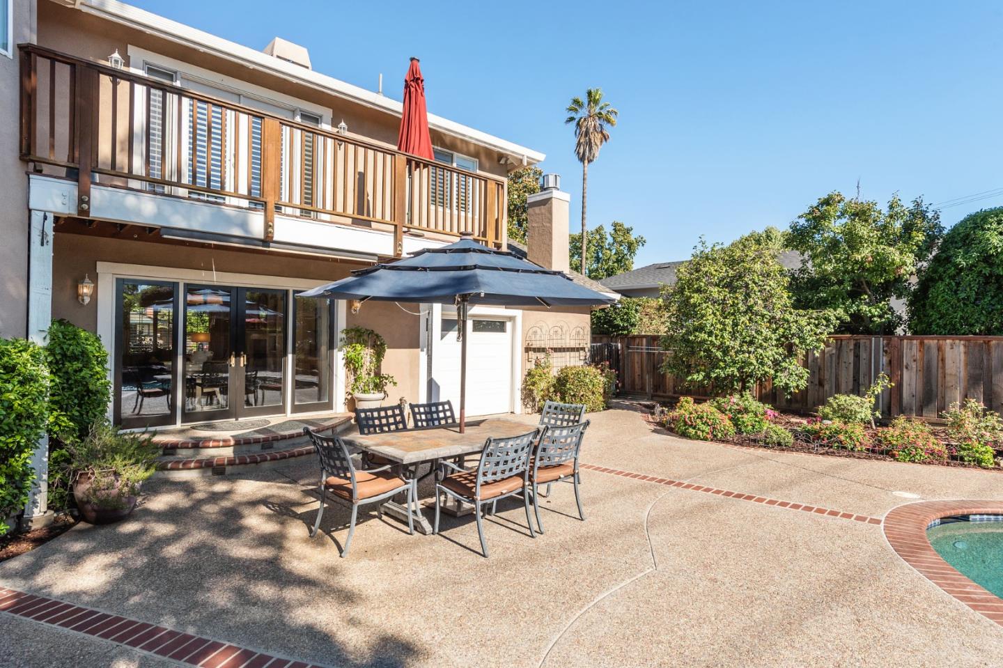 851 Almarida Drive Campbell, CA 95008 - Photo 53 of 63 a view of a house with backyard sitting area and garden