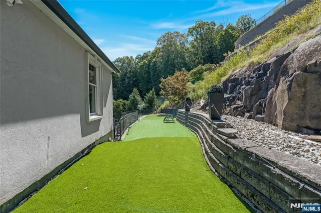a view of a backyard with plants