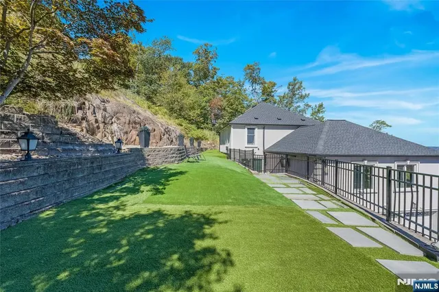 a porch with yard and outdoor seating