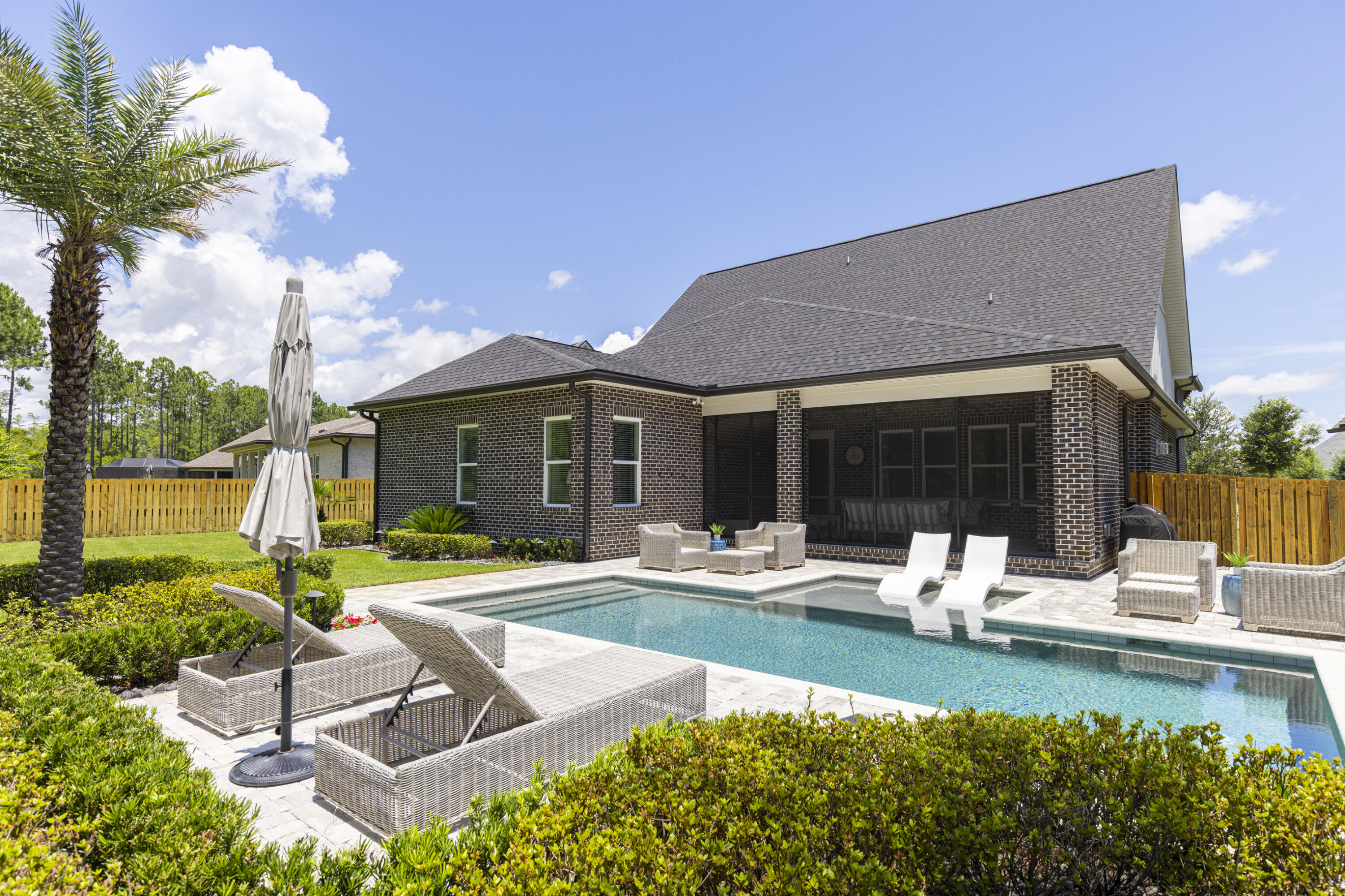 236 Revana Way Freeport, FL 32439 - Photo 54 of 96 Back Exterior + Pool Deck
