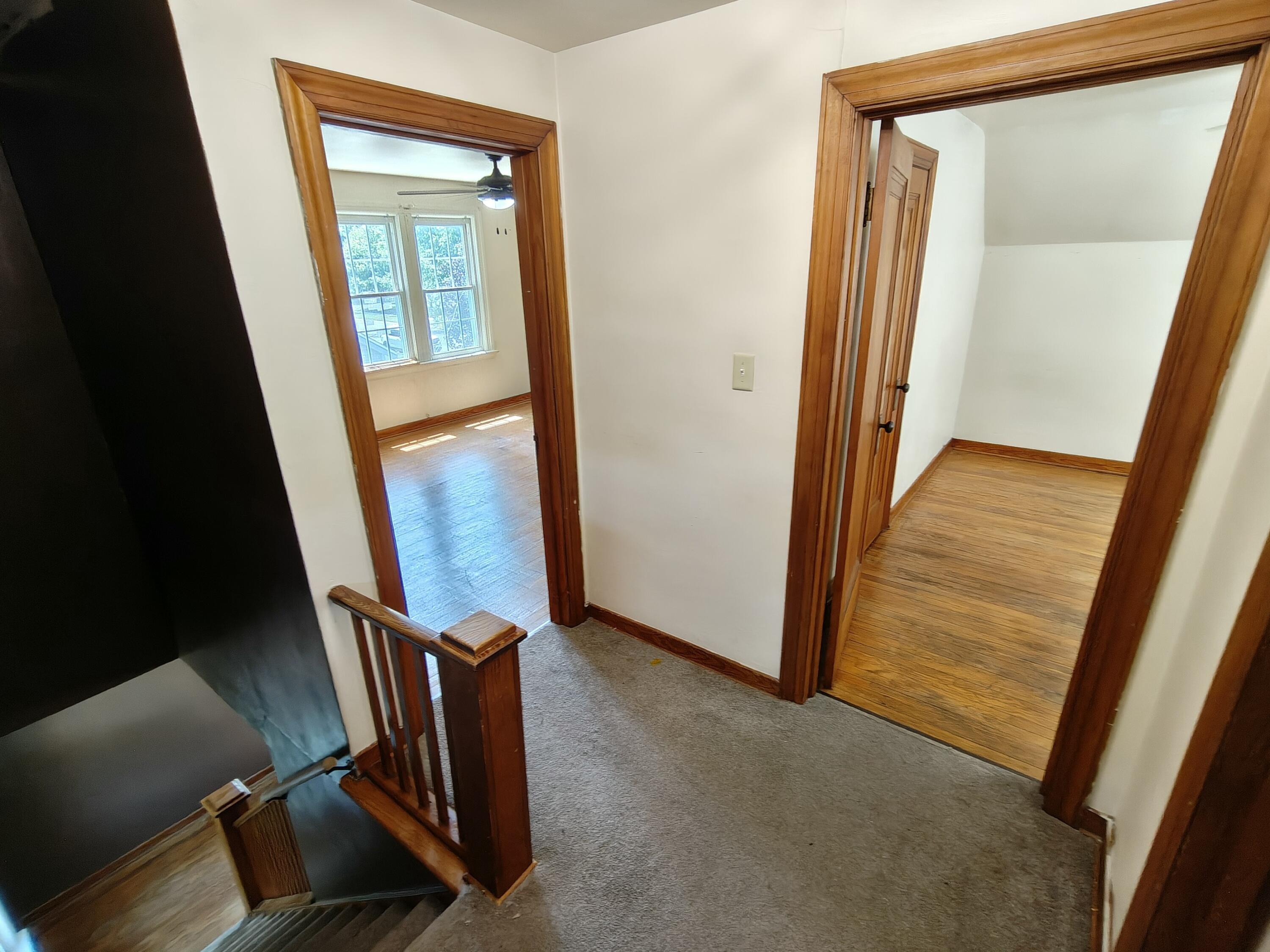 245 North Indiana Street Griffith, IN 46319 - Photo 12 of 30 workspace with wooden floor and windows