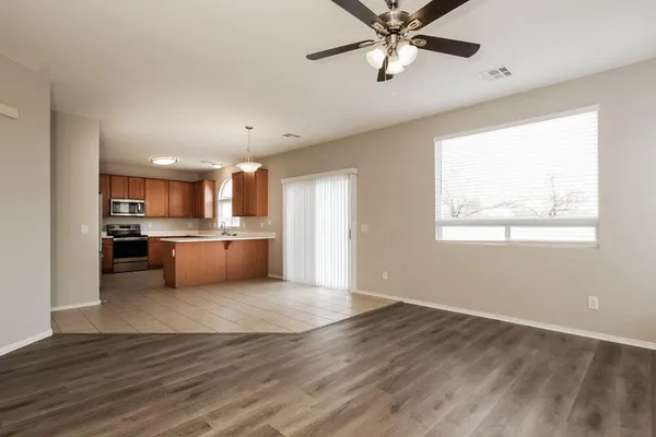 a view of kitchen with wooden floor