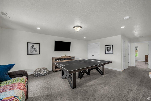 5010 Escapes Drive St. George, UT 84770 - Photo 16 of 46 Rec room with carpet flooring, a textured ceiling, and recessed lighting