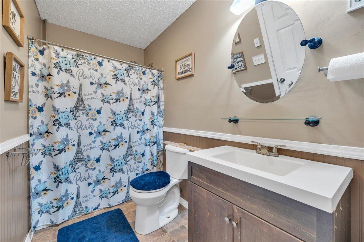 3870 Goose Dam Road Rocky Mount, VA 24151 - Photo 29 of 44 a bathroom with a sink toilet and shower