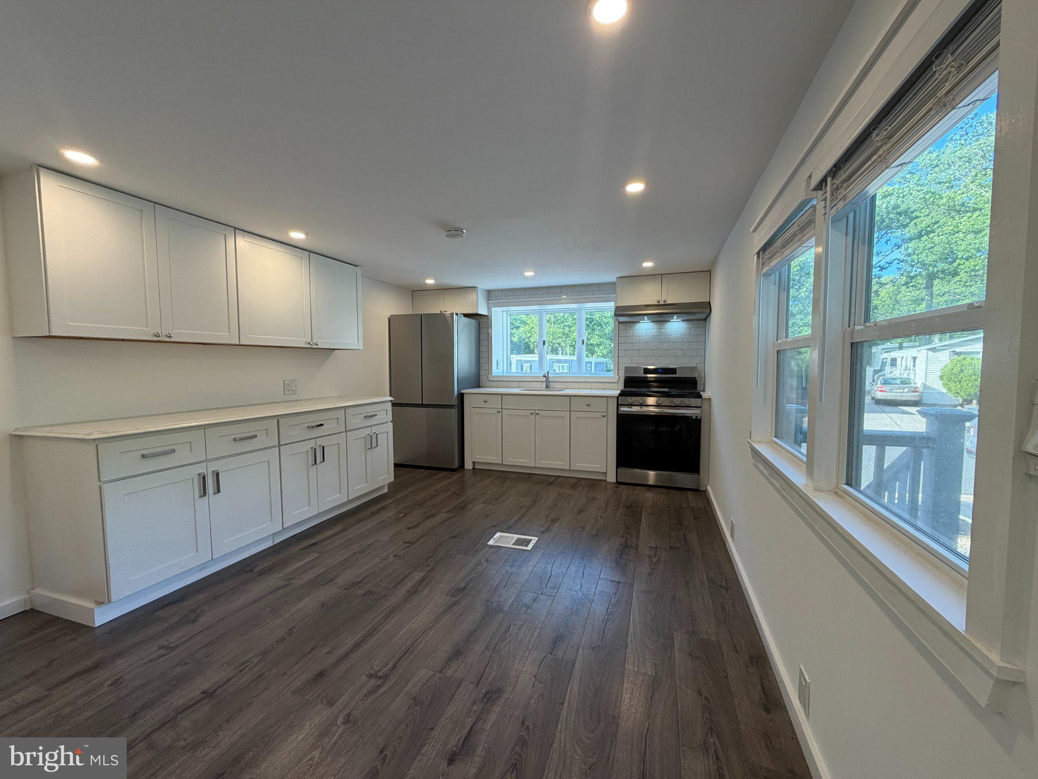66 Roberts Road Toms River, NJ 08755 - Photo 4 of 13 Bright and airy modern kitchen space.