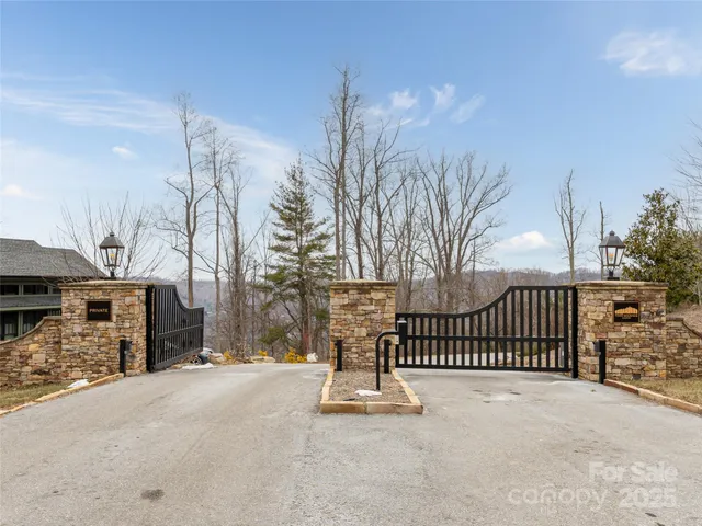 a sign board with parking in front of it