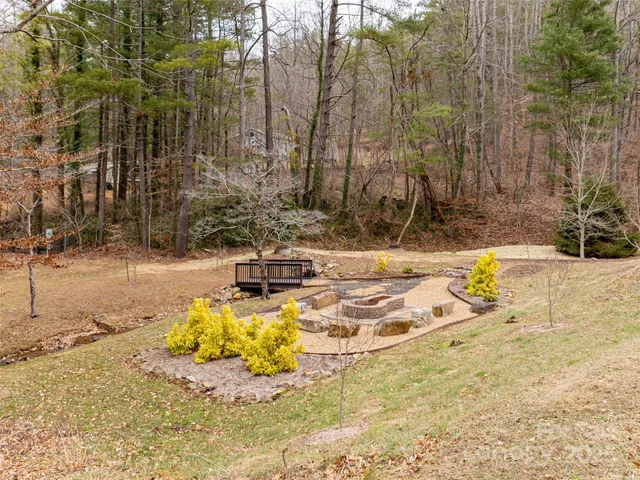 a view of swimming pool with a yard