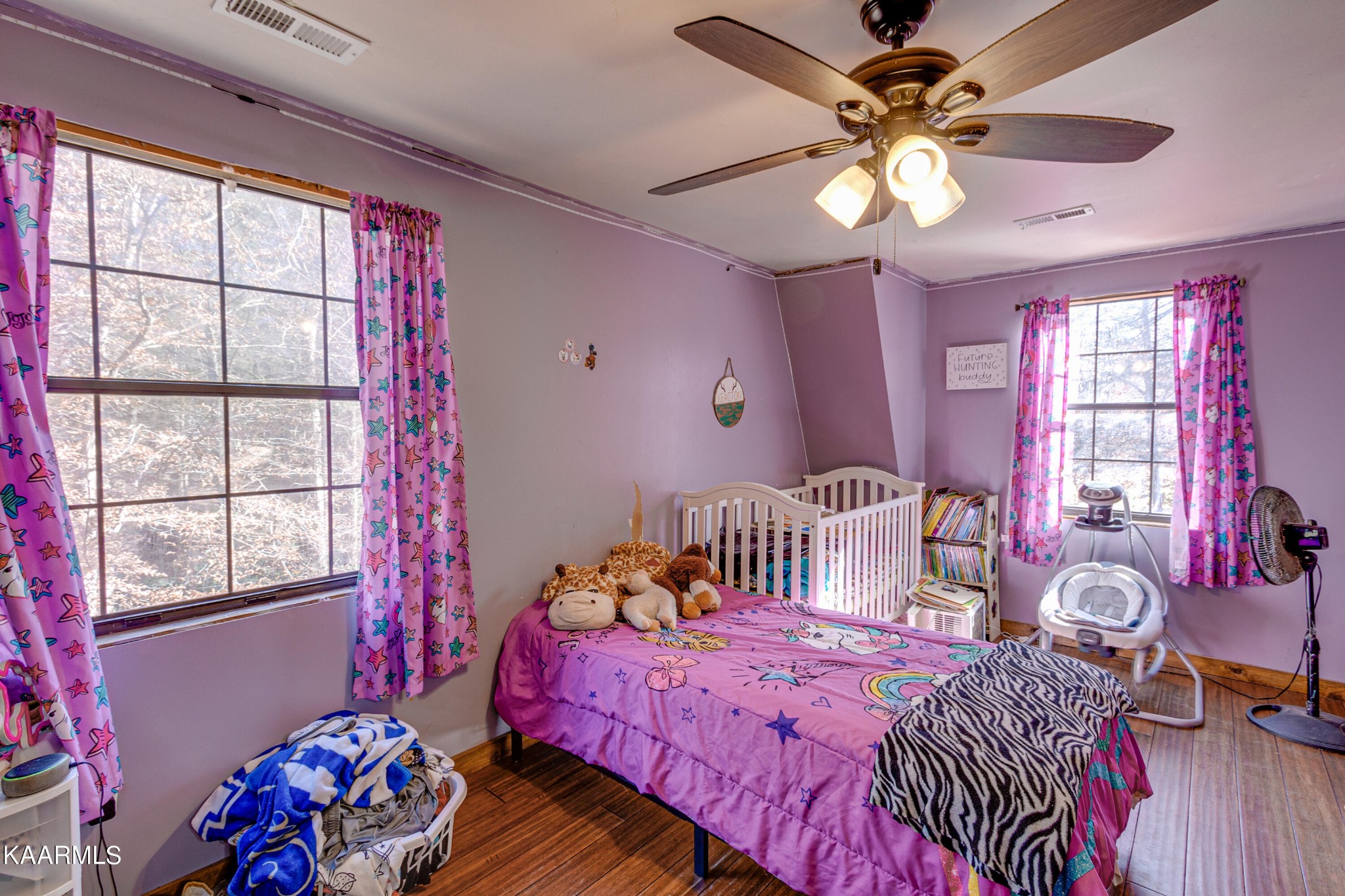 905 Williamsburg Road Winfield, TN 37892 - Photo 19 of 35 a bedroom with a bed dresser and a window