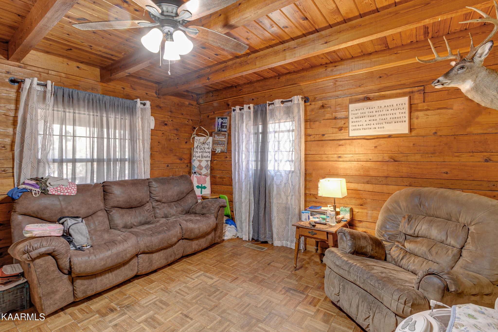 905 Williamsburg Road Winfield, TN 37892 - Photo 9 of 35 a living room with furniture and a chandelier