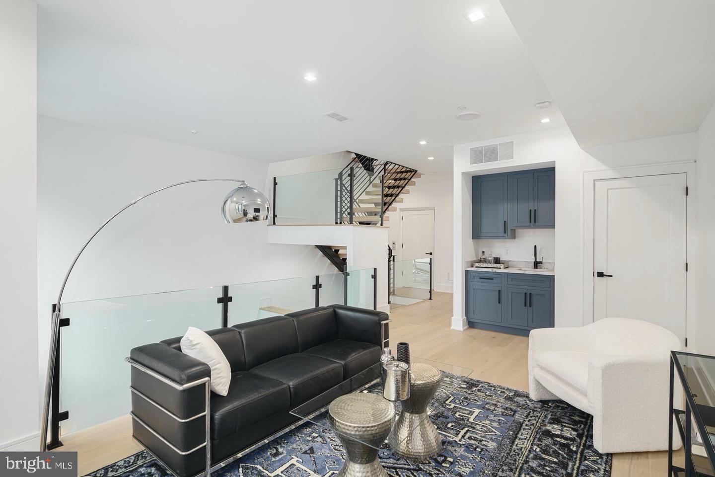 2316 Sansom Street Philadelphia, PA 19103 - Photo 17 of 55 a living room with furniture and a couch