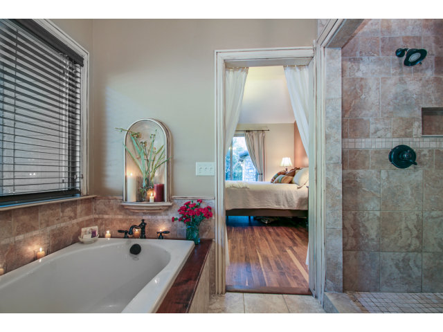 2791 Valencia Road Aptos, CA 95003 - Photo 12 of 21 a bathroom with a tub sink and mirror