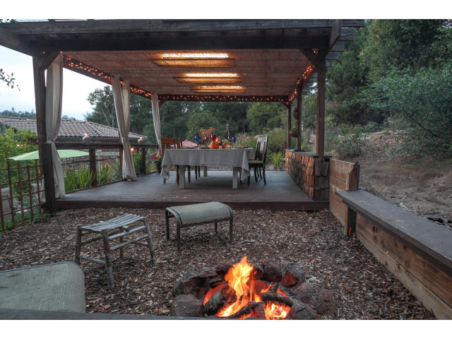 2791 Valencia Road Aptos, CA 95003 - Photo 13 of 21 a view of a patio with a table chairs and a backyard