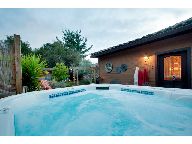2791 Valencia Road Aptos, CA 95003 - Photo 15 of 21 a view of a house with a yard and garage