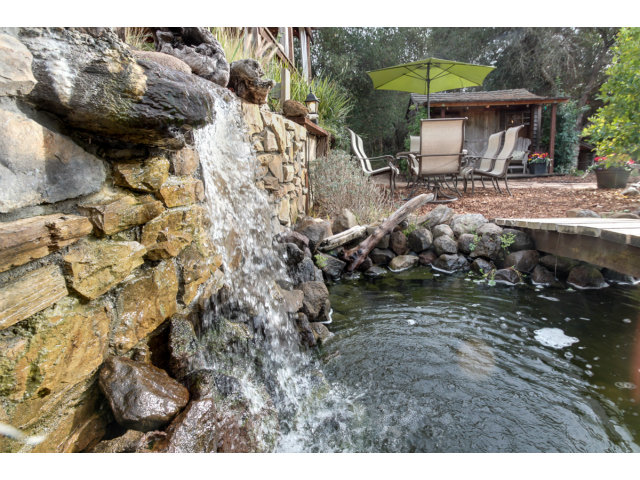 2791 Valencia Road Aptos, CA 95003 - Photo 19 of 21 a backyard of a house with table and chairs