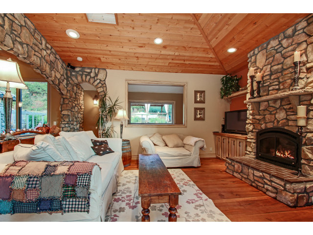 2791 Valencia Road Aptos, CA 95003 - Photo 7 of 21 a living room with furniture and a fireplace