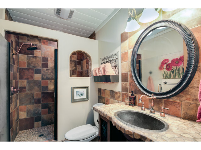 2791 Valencia Road Aptos, CA 95003 - Photo 9 of 21 a bathroom with a sink and a mirror
