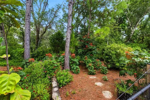 a house with trees in the background