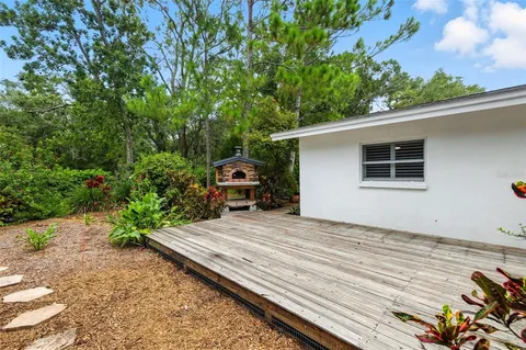 an outdoor view of garden with seating area