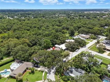 a view of swimming pool with a yard