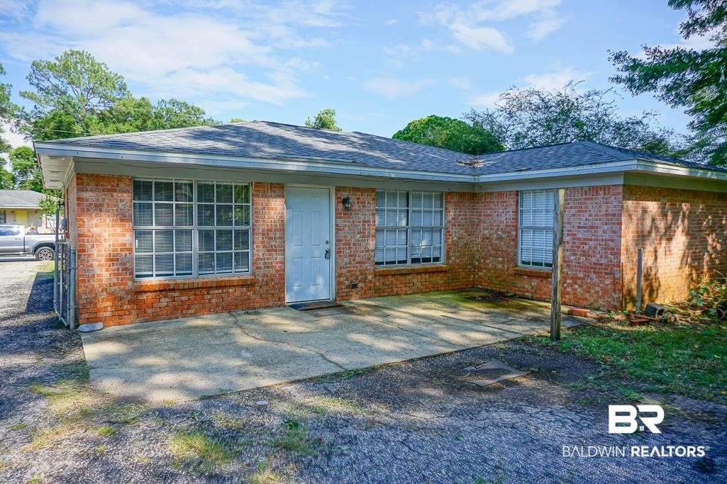 4366 Fathbrook Lane Mobile, AL 36693 - Photo 3 of 14 Single story home featuring a patio area and brick siding