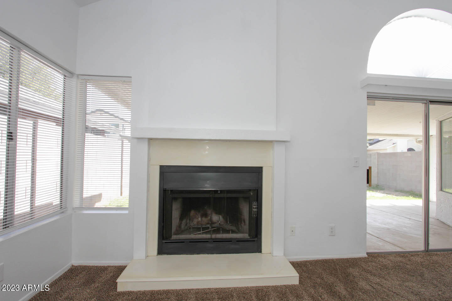4401 West Tonto Road Glendale, AZ 85308 - Photo 13 of 29 a living room with a fireplace