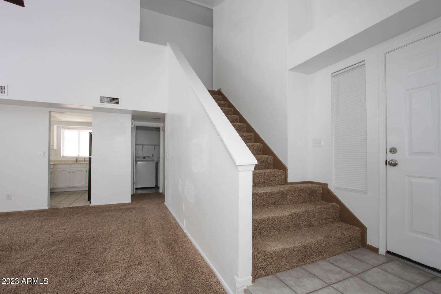 4401 West Tonto Road Glendale, AZ 85308 - Photo 15 of 29 a view of a hallway view with staircase
