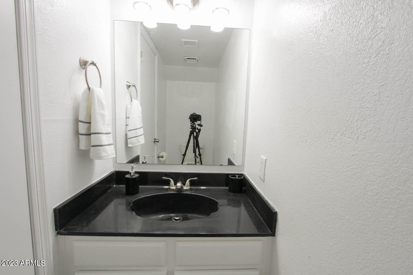 4401 West Tonto Road Glendale, AZ 85308 - Photo 17 of 29 a close view of a sink and tap