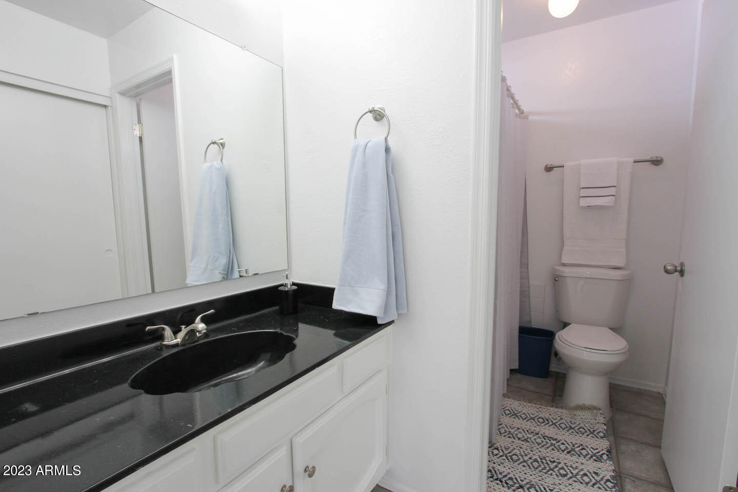 4401 West Tonto Road Glendale, AZ 85308 - Photo 25 of 29 a bathroom with a sink and a toilet
