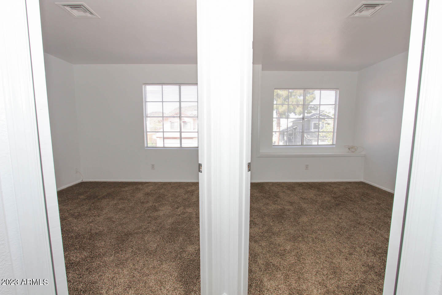 4401 West Tonto Road Glendale, AZ 85308 - Photo 28 of 29 an empty room with windows