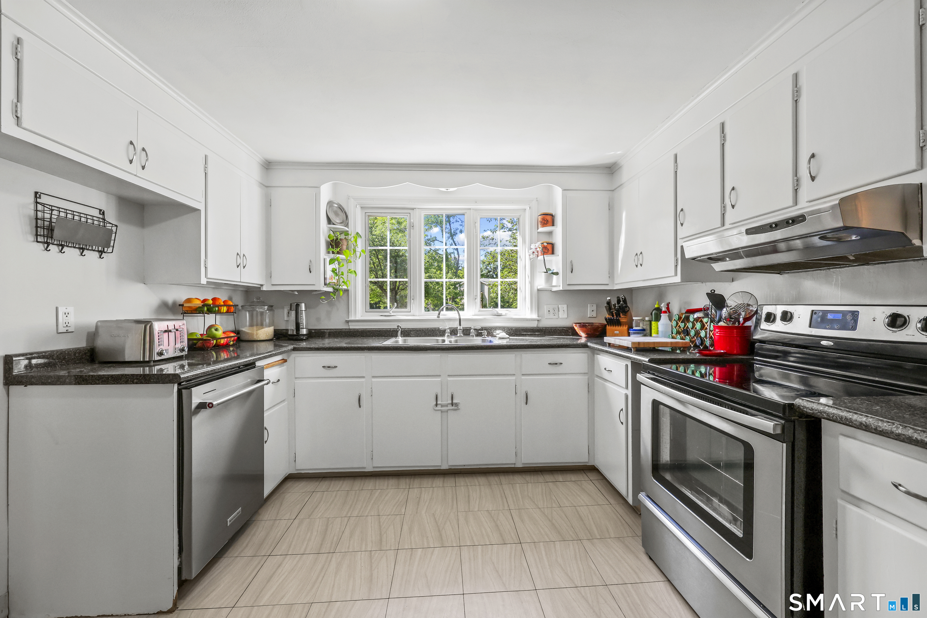 73 Longlane Road West Hartford, CT 06117 - Photo 7 of 30 Spacious Kitchen Boasts New Fridge and Dishwasher