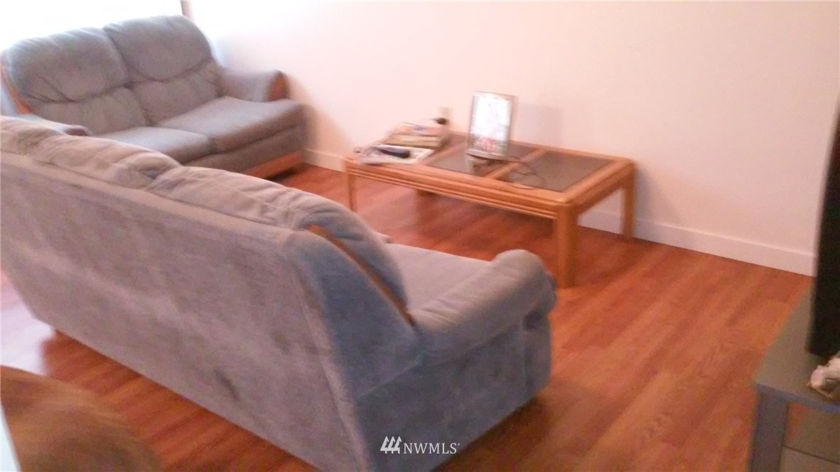 9240 Garrison Road Sumas, WA 98295 - Photo 7 of 16 a living room with furniture and wooden floor