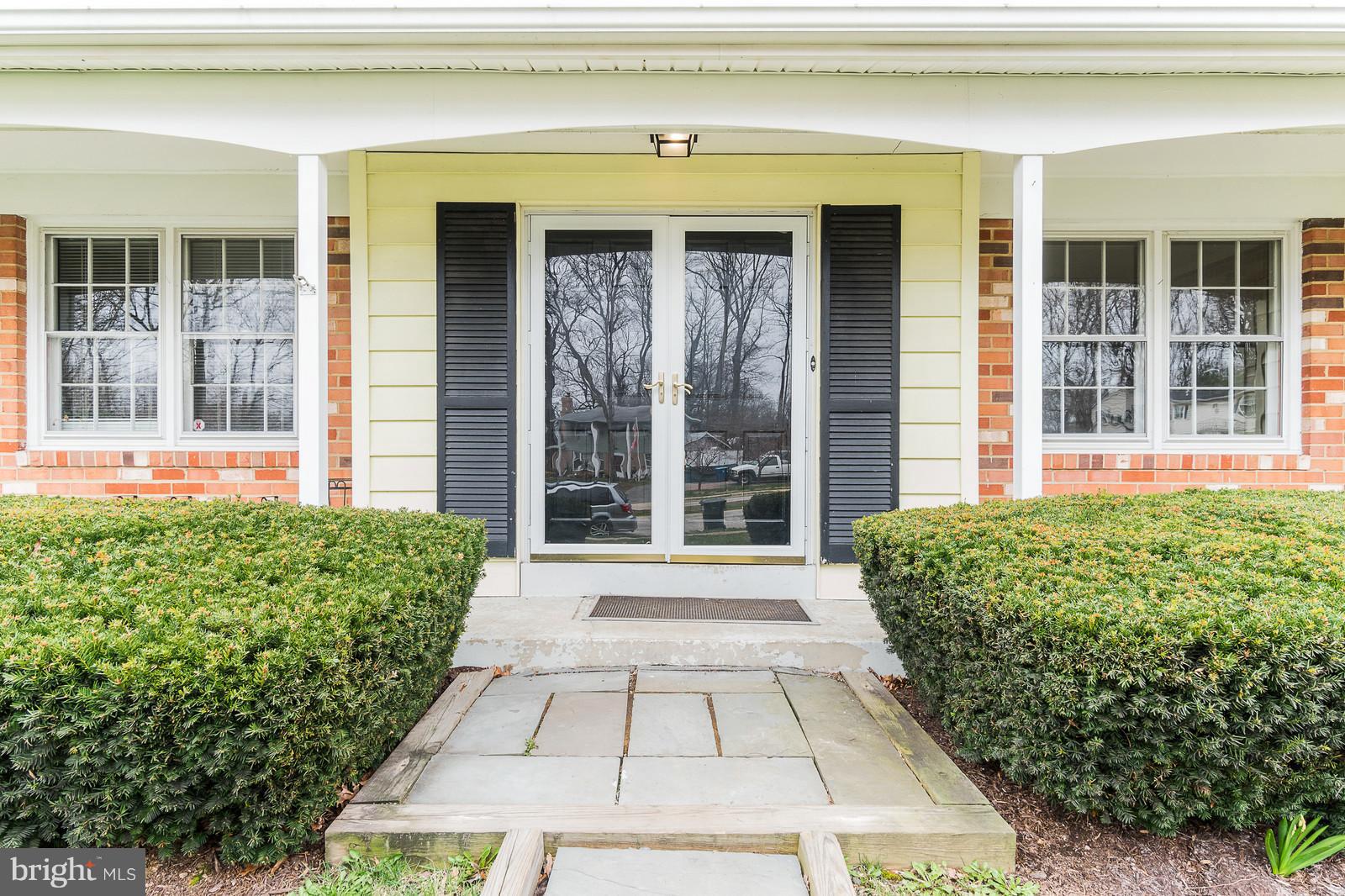 6723 Huntsman Boulevard Springfield, VA 22152 - Photo 2 of 32 front view of a house