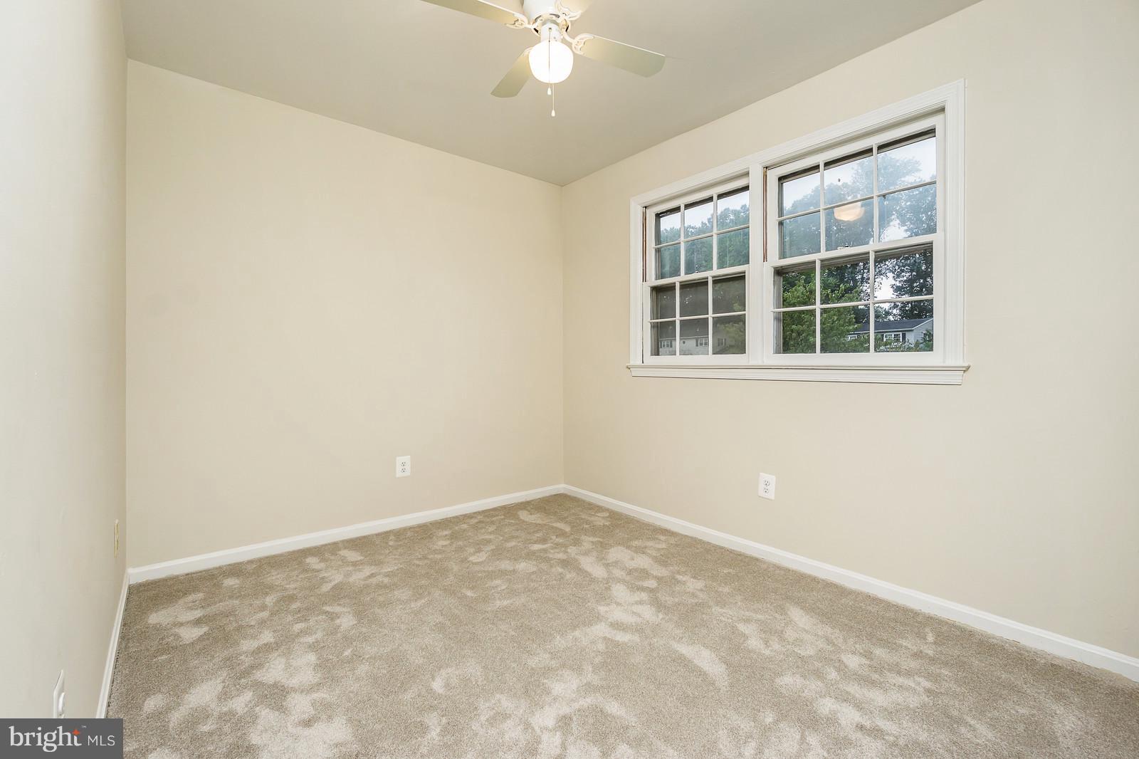 6723 Huntsman Boulevard Springfield, VA 22152 - Photo 15 of 32 an empty room with a window