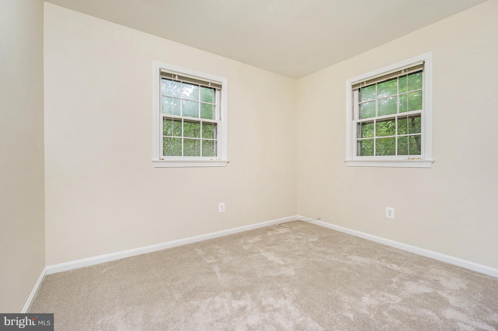6723 Huntsman Boulevard Springfield, VA 22152 - Photo 17 of 32 an empty room with a window