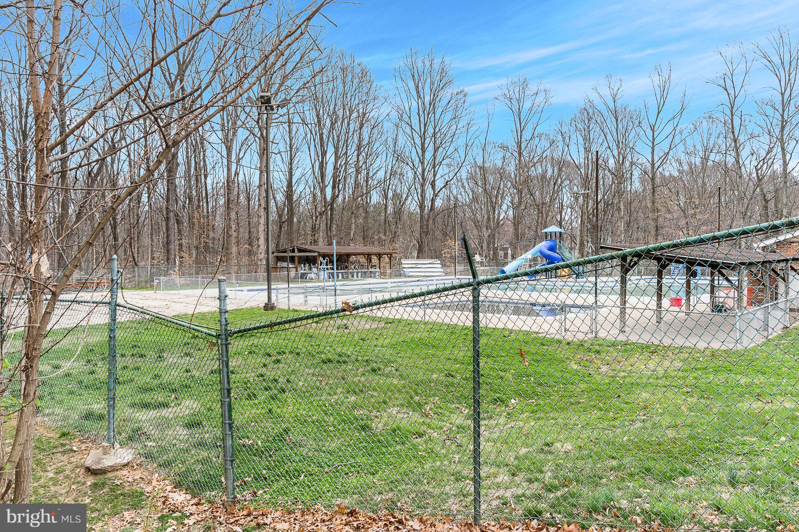 6723 Huntsman Boulevard Springfield, VA 22152 - Photo 23 of 32 a view of a backyard