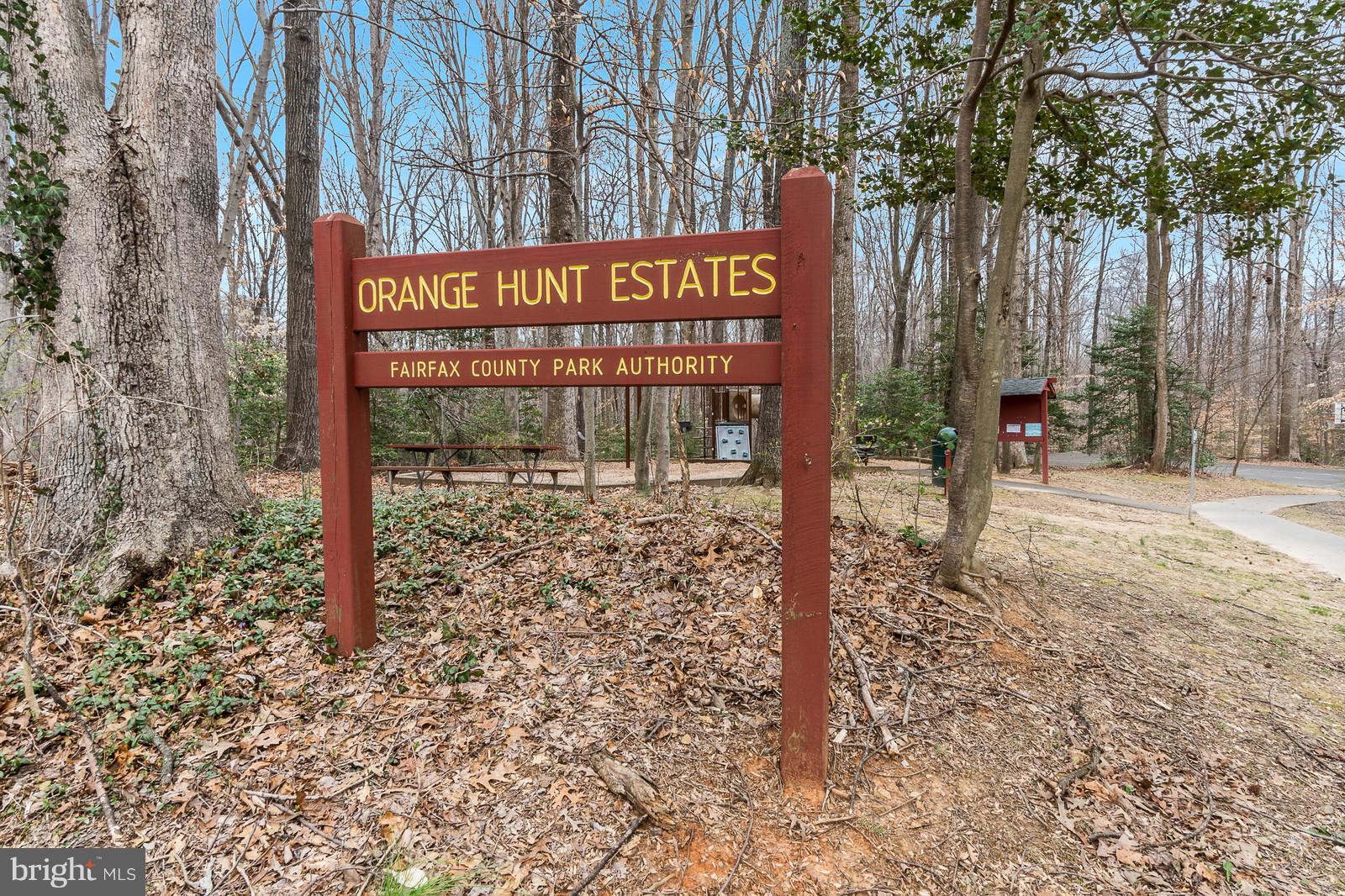 6723 Huntsman Boulevard Springfield, VA 22152 - Photo 24 of 32 a sign broad in front of a road