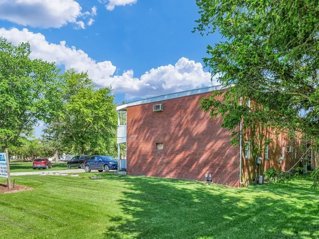 a backyard of a house with lots of green space