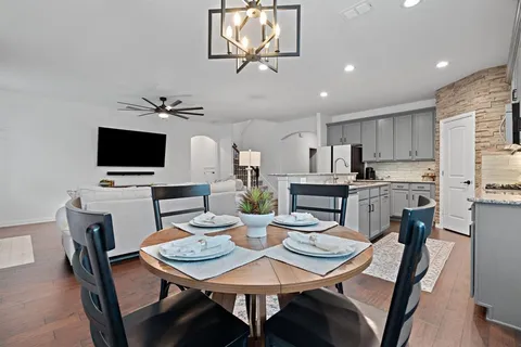 a view of a dining room with furniture