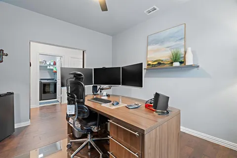 a house with swimming pool in front of it