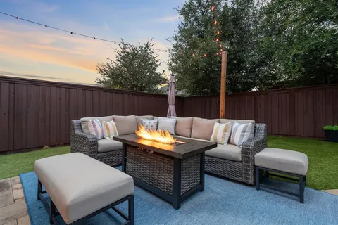 a outdoor living space with furniture and garden