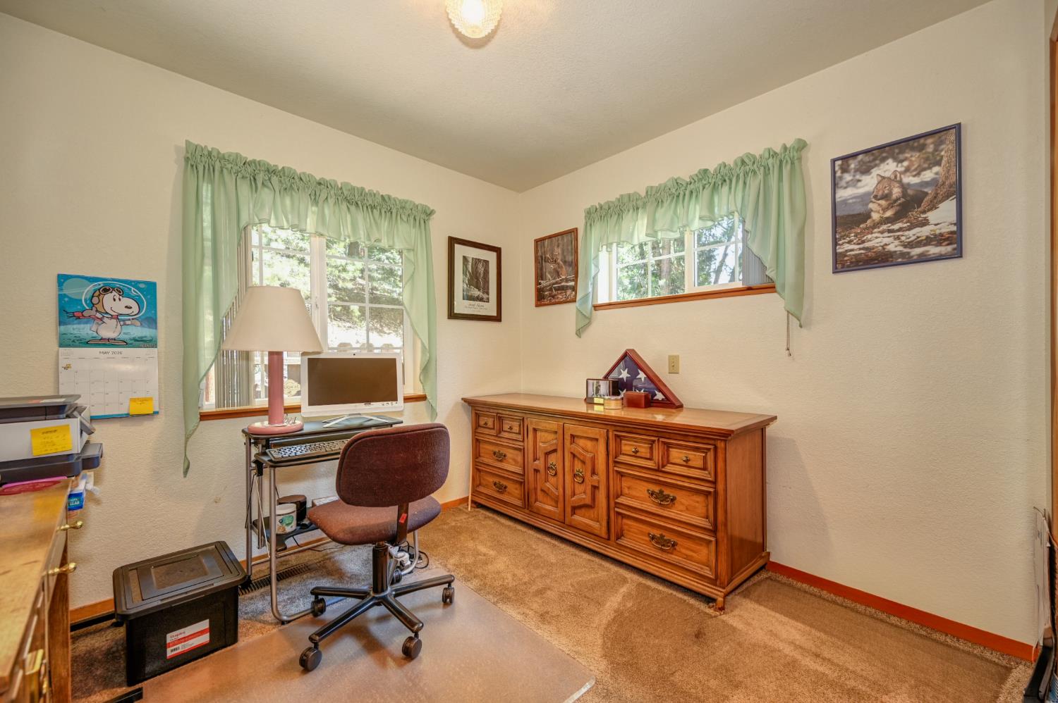 23998 Stable Road Sonora, CA 95370 - Photo 21 of 41 a view of a workspace with furniture and a window