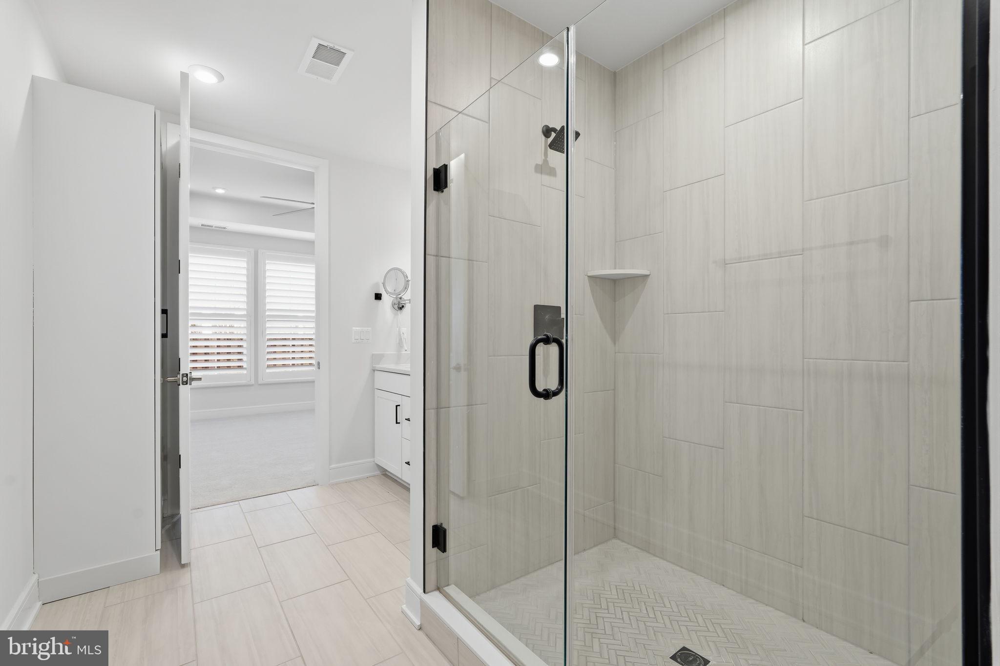 14679 Grand Cru Loop Gainesville, VA 20155 - Photo 19 of 41 a bathroom with a shower