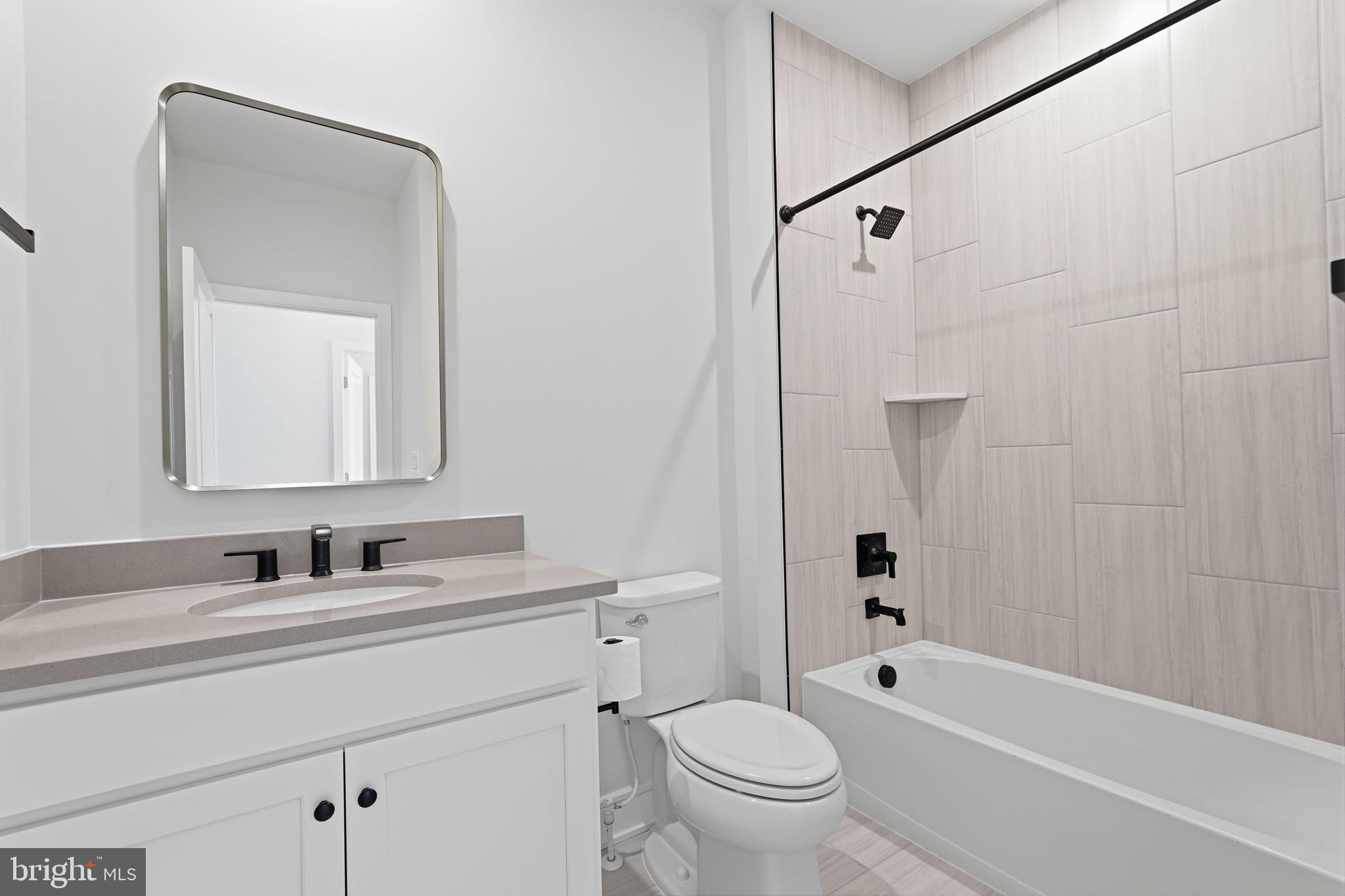 14679 Grand Cru Loop Gainesville, VA 20155 - Photo 28 of 41 a bathroom with a sink toilet and shower