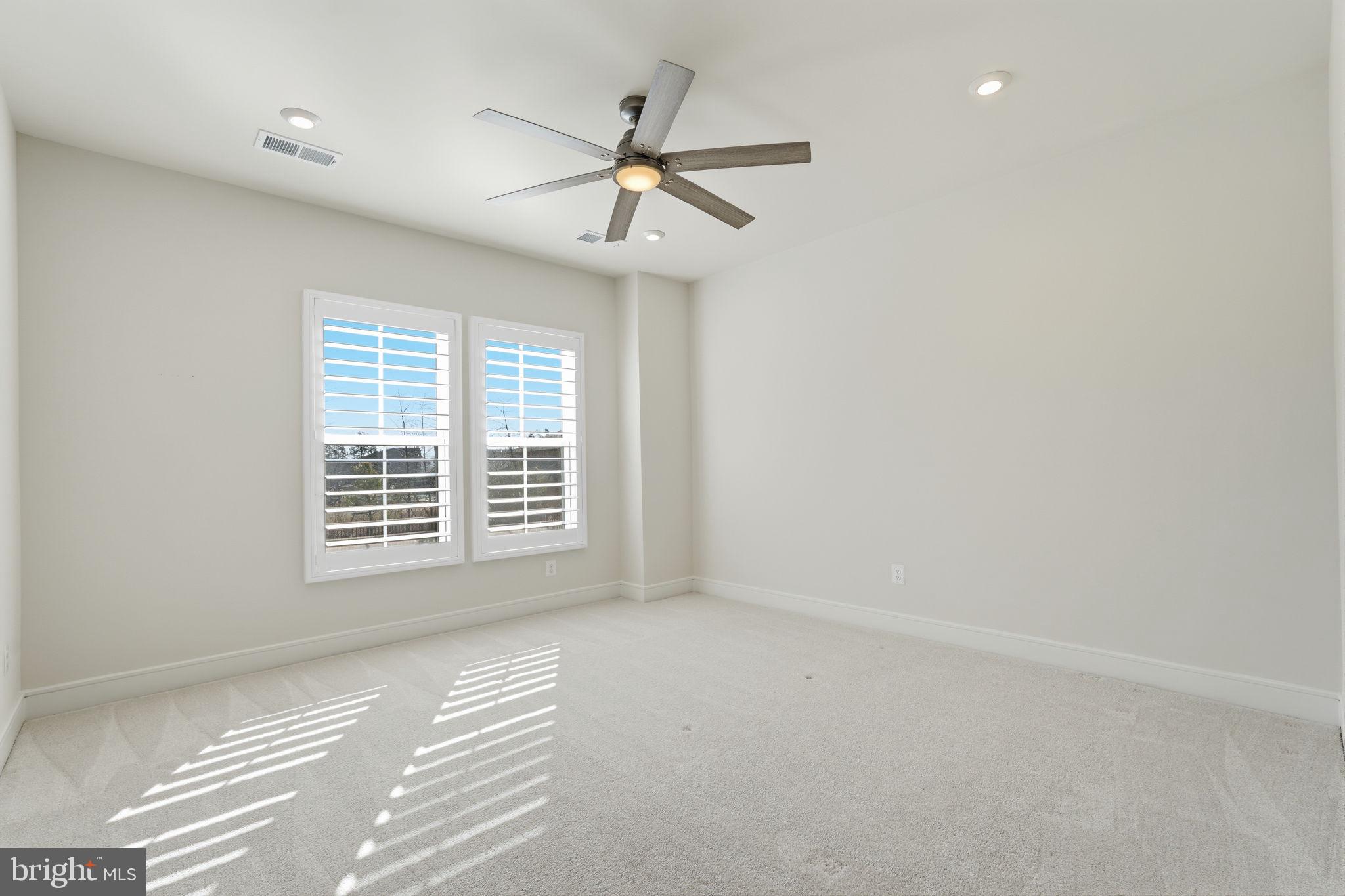 14679 Grand Cru Loop Gainesville, VA 20155 - Photo 31 of 41 a view of an empty room with a window