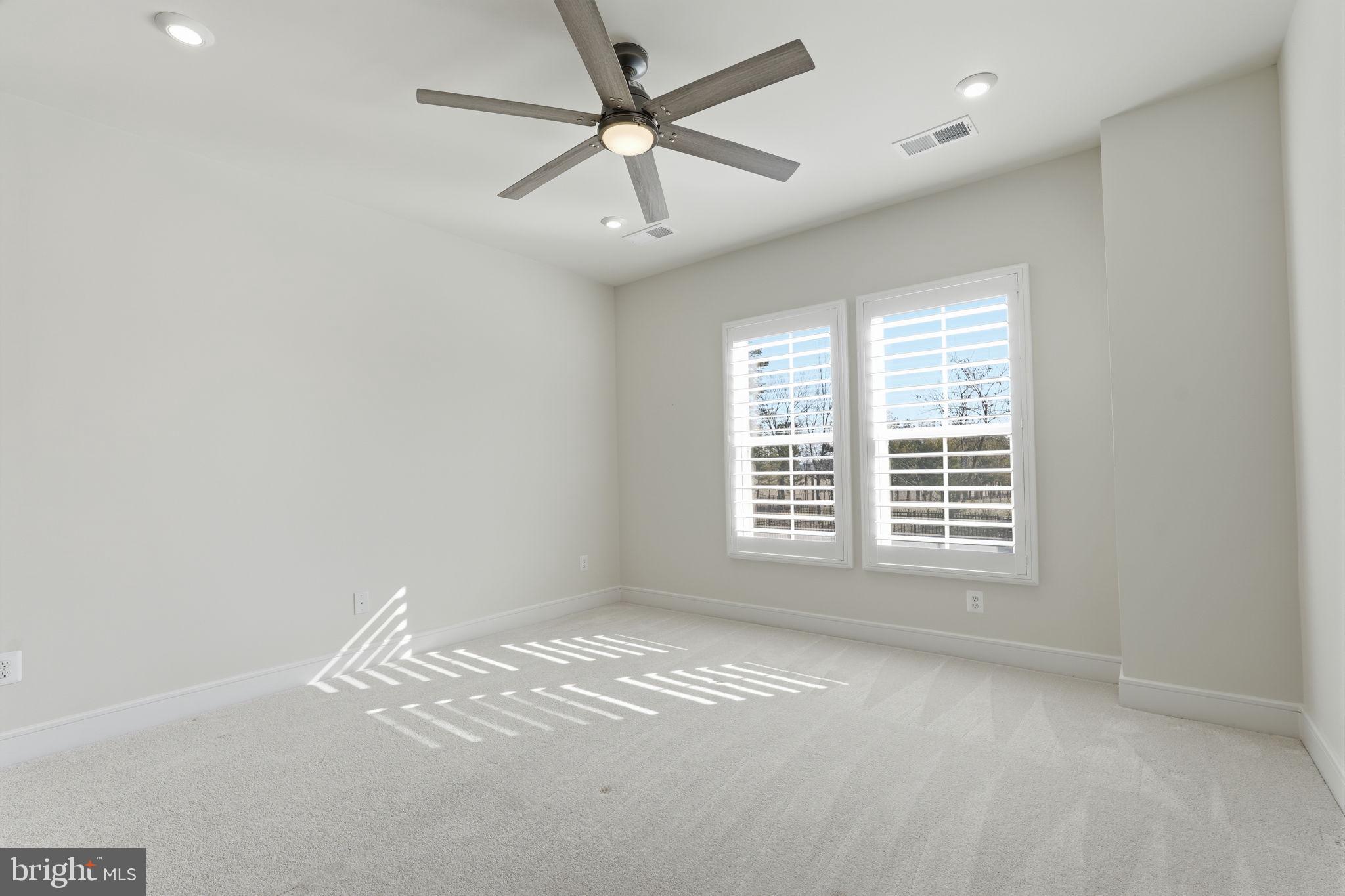 14679 Grand Cru Loop Gainesville, VA 20155 - Photo 32 of 41 a view of an empty room with a window