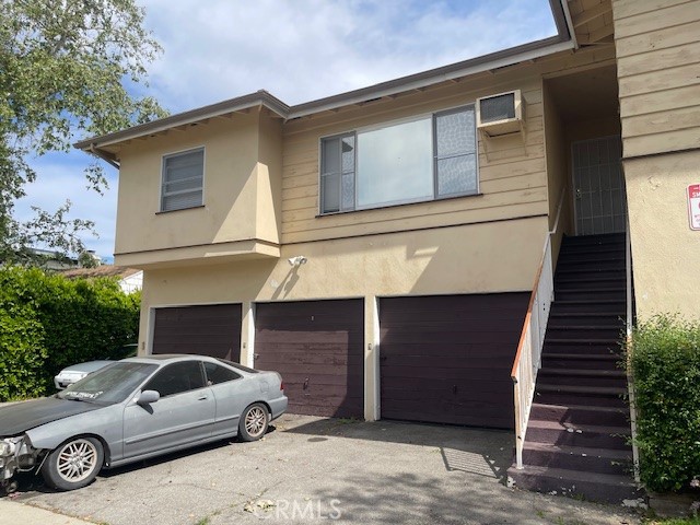 14225 Riverside Drive Sherman Oaks, CA 91423 - Photo 14 of 15 a view of a car parked front of a house