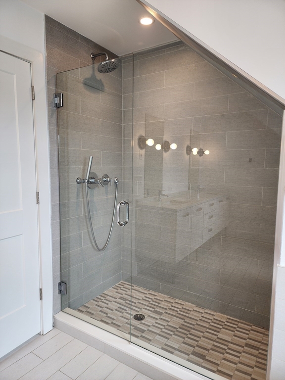 84 Romsey Street, Unit 3 Boston, MA 02125 - Photo 14 of 22 a bathroom with a glass shower door