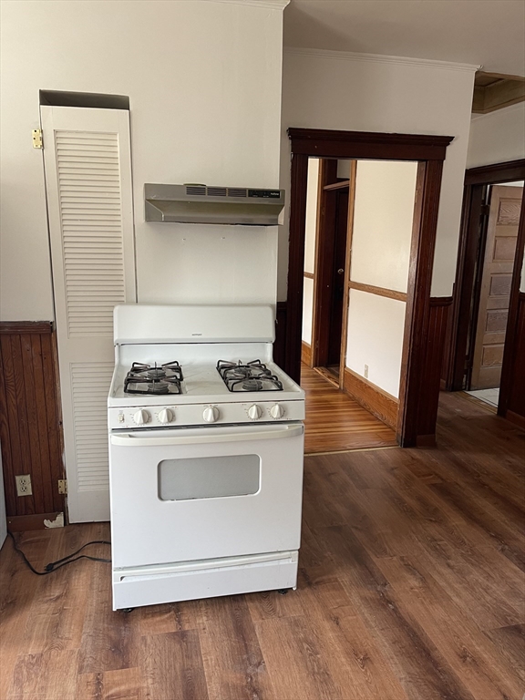 25 Perkins Street, Unit 3 Salem, MA 01970 - Photo 6 of 8 a stove top oven sitting inside of a kitchen